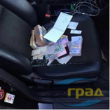Подполковник полиции сбывал в Одессе фальшивые доллары