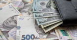Гривна обновила новый исторический минимум к доллару