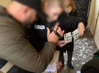 В Одесі поліція затримала організаторку «схеми» виїзду за кордон